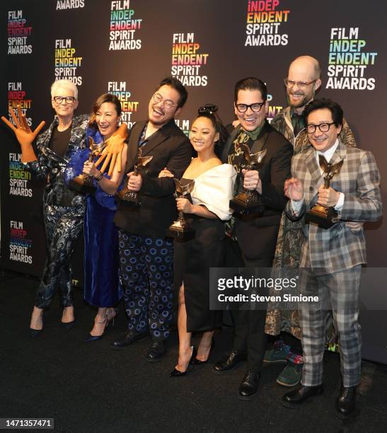 Jamie Lee Curtis, Michelle Yeoh, Dan Kwan, Stephanie Hsu, Jonathan Wang, Daniel Scheinert and Ke Huy Quan, winners of the Best Feature award for...