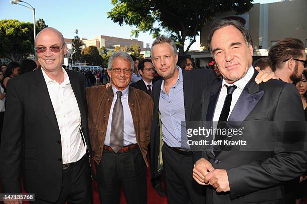 Producer Moritz Borman, President & CEO of Universal Studios Ron Meyer, producer Eric Kopeloff and Director Oliver Stone arrive at the Los Angeles...