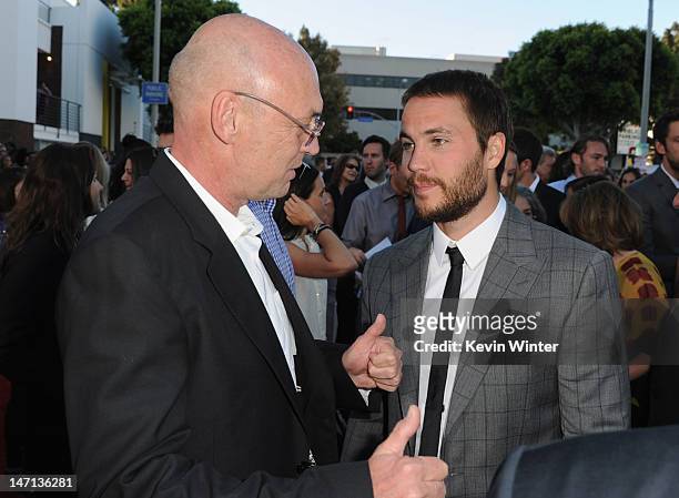 Producer Moritz Borman and actor Taylor Kitsch arrive at Premiere of Universal Pictures' "Savages" at Westwood Village on June 25, 2012 in Los...