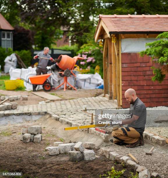 granite cobble path construction - granite cobblestones stock pictures, royalty-free photos & images