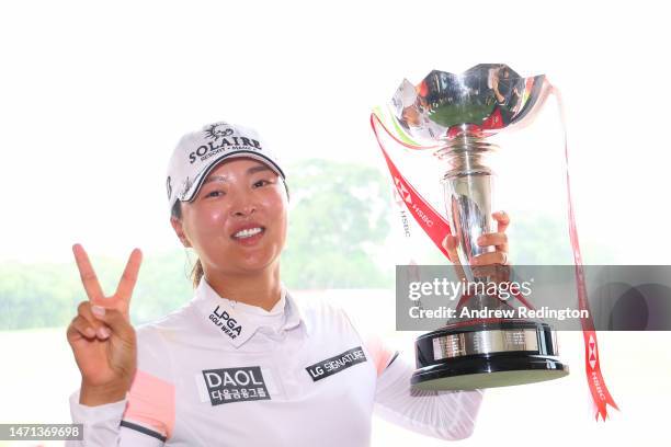 Jin Young Ko of South Korea poses with the trophy after winning the HSBC Women's World Championship during Day Four of the HSBC Women's World...