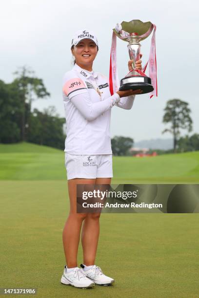 Jin Young Ko of South Korea poses with the trophy after winning the HSBC Women's World Championship during Day Four of the HSBC Women's World...