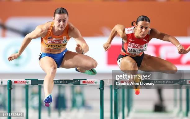 Nadine Visser of the Netherlands and Mujinga Kambundji of Switzerland competes during the Women's 60m Hurdles Semi Finals during Day 3 of the...