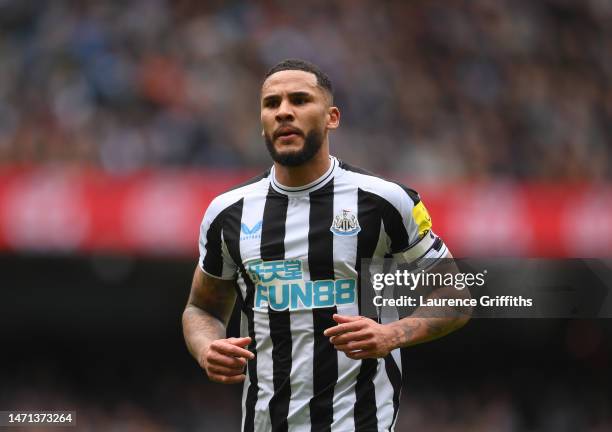 Jamaal Lascelles of Newcastle United looks on during the Premier League match between Manchester City and Newcastle United at Etihad Stadium on March...