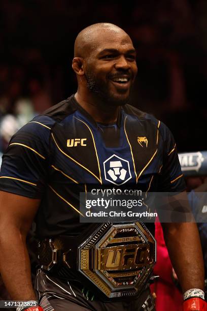 Jon Jones celebrates after winning during the UFC heavyweight championship fight against Ciryl Gane of France during the UFC 285 event at T-Mobile...