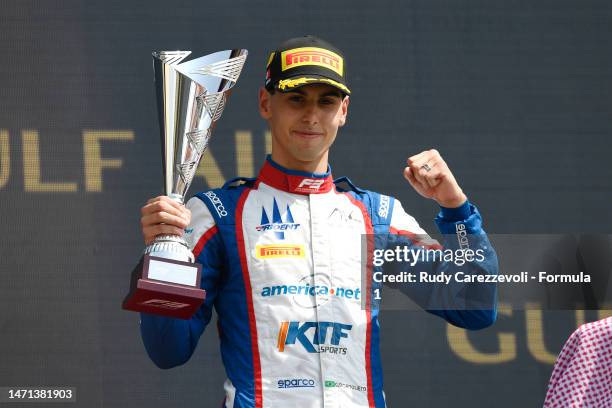 Race winner Gabriel Bortoleto of Brazil and Trident celebrates on the podium during the Round 1:Sakhir Feature race of the Formula 3 Championship at...