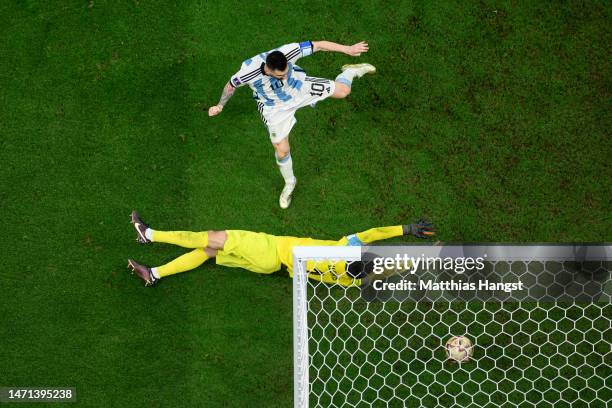 Lionel Messi of Argentina scores the team's third goal past Hugo Lloris of France during the FIFA World Cup Qatar 2022 Final match between Argentina...