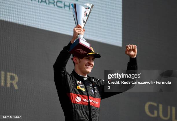 Race winner Theo Pourchaire of France and ART Grand Prix celebrates on the podium during the Round 1:Sakhir Feature race of the Formula 2...