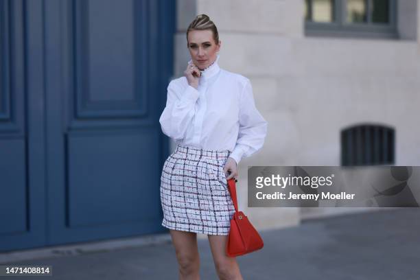 Marina von Lison seen wearing Alexandre Vauthier white blouse shirt, Alexandre Vauthier white / blue / red checked short skirt, Thalie Paris red...