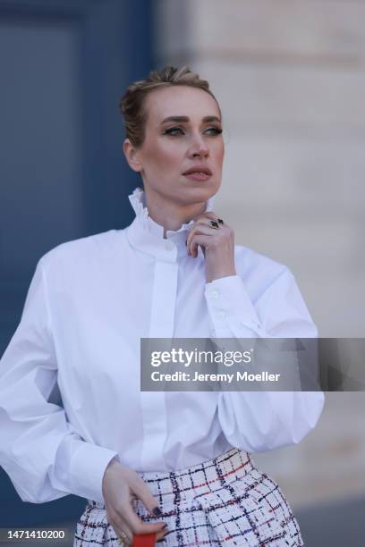 Marina von Lison seen wearing Alexandre Vauthier white blouse shirt, Alexandre Vauthier white / blue / red checked short skirt, Thalie Paris red...