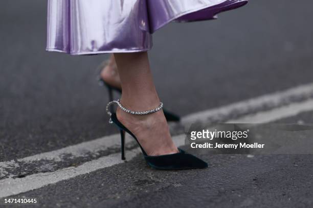 Marina von Lison seen wearing long purple RVNG couture dress, black with glitter Jimmy Choo heels before Elie Saab show during Paris Fashion Week on...