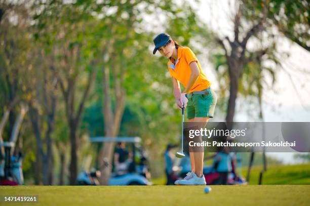 woman golf player - professional golfer stock pictures, royalty-free photos & images