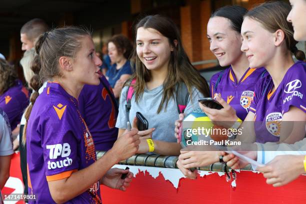 Natasha Rigby of the Glory signs autographs for young supporters following the round 16 A-League Women's match between Perth Glory and Western Sydney...