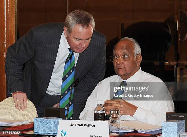 President, Sharad Pawar talks to ICC Vice President, Alan Isaac during the ICC Executive Board meeting convened during the ICC Annual Conference held...