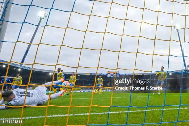 Jasmin Fejzic of Braunschweig receives a goal by Jomaine Consbruch of Bielefeld during the Second Bundesliga match between Eintracht Braunschweig and...