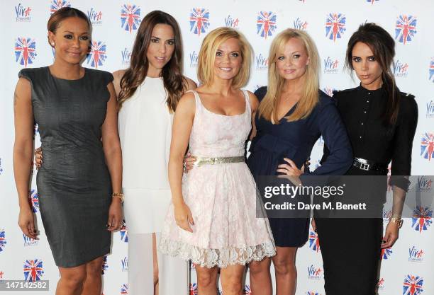 Melanie Brown aka Mel B, Melanie Chisholm aka Mel C, Geri Halliwell, Emma Bunton and Victoria Beckham pose at the press launch of 'Viva Forever', a...