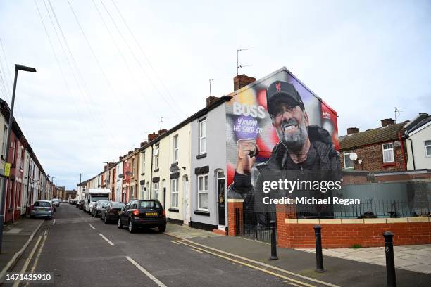 General view of a mural of Juergen Klopp, Manager of Liverpool, on the wall of a house outside the stadium prior to the Premier League match between...