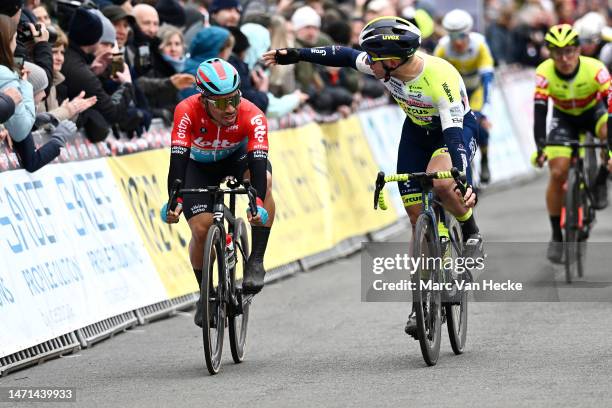 Caleb Ewan of Australia and Team Lotto Dstny, Gerben Thijssen of Belgium and Team Intermarché - Circus - Wanty after cross the finish line in the...