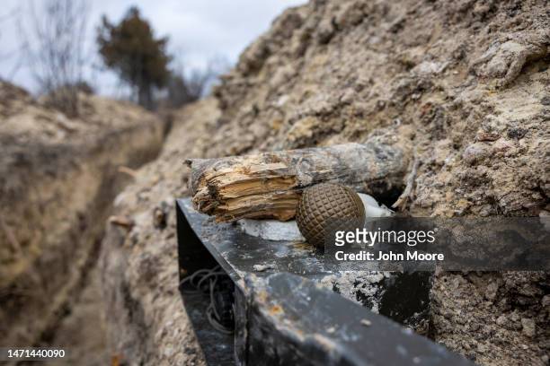 Grenade lies next to a Ukrainian fighting position in a frontline trench facing Russian troops on March 05, 2023 outside of Bakhmut, Ukraine. Russian...