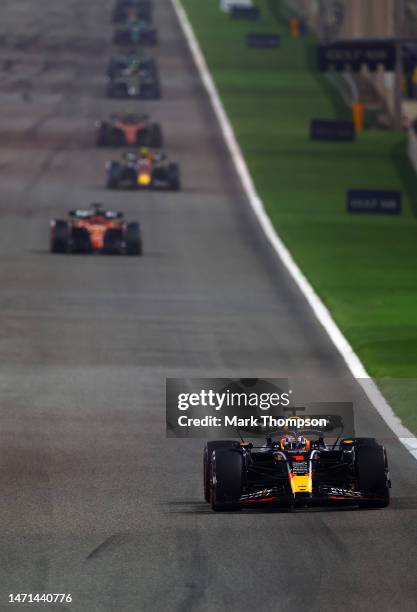 Max Verstappen of the Netherlands driving the Oracle Red Bull Racing RB19 leads Charles Leclerc of Monaco driving the Ferrari SF-23 during the F1...