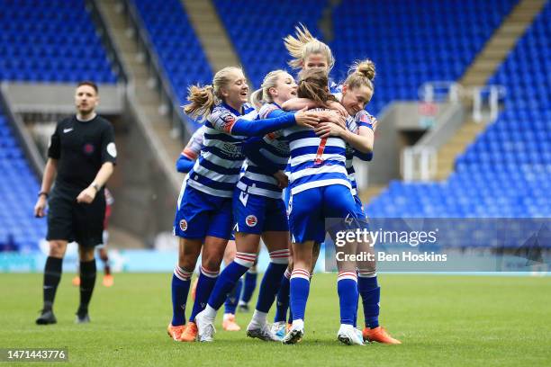 Charlie Wellings of Reading celebrates with teammates after scoring the team's first goal during the FA Women's Super League match between Reading...