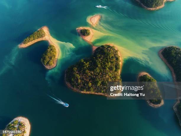 heart shape island in a lake with beautiful color - china reservoir stock pictures, royalty-free photos & images