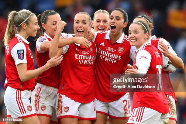 Rafaelle Souza of Arsenal celebrates with teammates after the teams third goal, an own goal scored by Niamh Charles of Chelsea during the FA Women's...