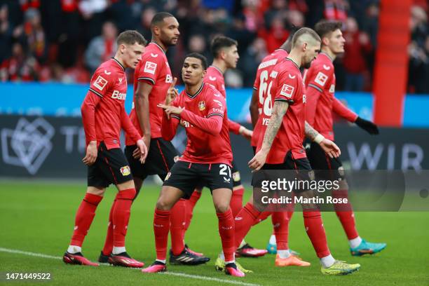 Amine Adli of Bayer 04 Leverkusen celebrates after scoring the team's fourth goal during the Bundesliga match between Bayer 04 Leverkusen and Hertha...