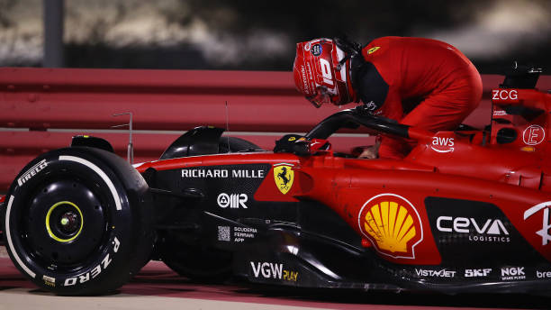 Charles Leclerc of Monaco and Ferrari climbs from his car after retiring from the race during the F1 Grand Prix of Bahrain at Bahrain International...