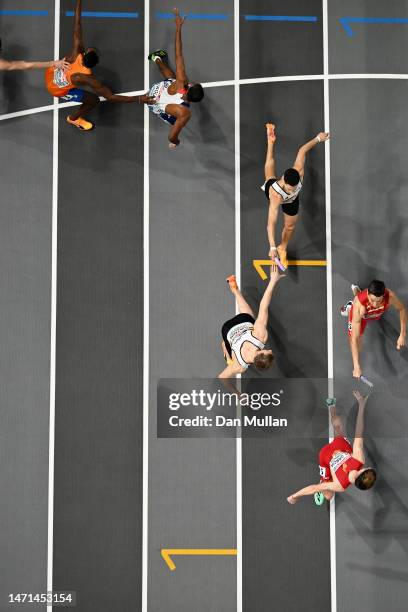 Team Spain hand over the baton in first place during the Men's 4 x 400m Relay Final during Day 3 of the European Athletics Indoor Championships at...