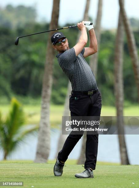 Chris Stroud of the United States hits his first shot on the 3rd hole during the final round of the Puerto Rico Open at Grand Reserve Golf Club on...