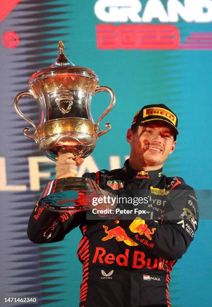 Race winner Max Verstappen of the Netherlands and Oracle Red Bull Racing celebrates on the podium during the F1 Grand Prix of Bahrain at Bahrain...