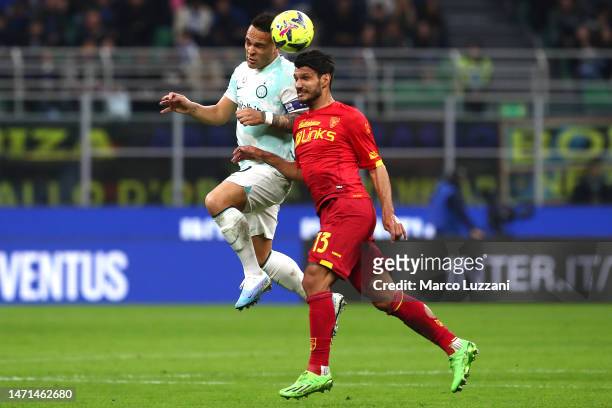 Lautaro Martinez of FC Internazionale clashes with Alessandro Tuia of US Lecce during the Serie A match between FC Internazionale and US Lecce at...