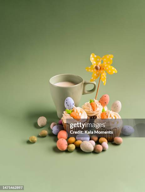 easter eggs with milk, muffins and a windmill - easter cupcake stock pictures, royalty-free photos & images