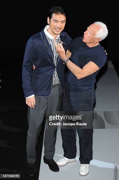 Takeshi Kaneshiro and Giorgio Armani attend the Giorgio Armani show as part of Milan Fashion Week Menswear Spring/Summer 2013 on June 26, 2012 in...