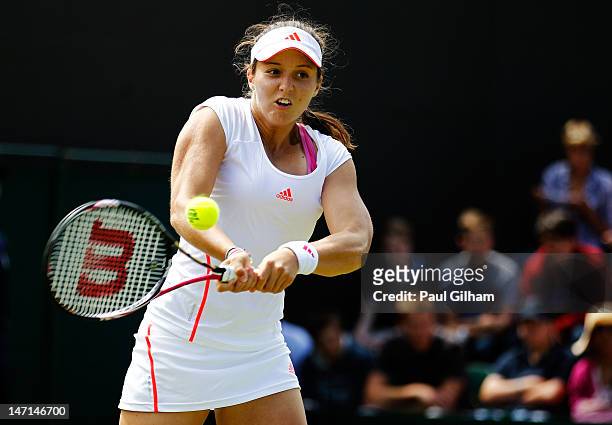 Laura Robson of Great Britain hits a backhand return during her Ladies' Singles first round match against Francesca Schiavone of Italy on day two of...