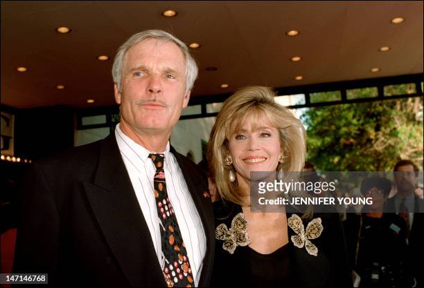 Media mogul Ted Turner and his wife actress Jane Fonda arrive 04 October 2003 in Washington at the premiere of "Guettysburg" a new four-hour motion...