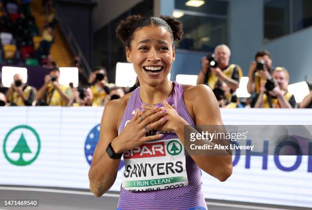 Jazmin Sawyers of Great Britain reacts after jumping 7m during the Women's Long Jump Final during Day 3 of the European Athletics Indoor...