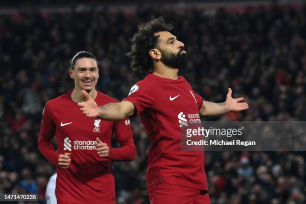 Mohamed Salah of Liverpool celebrates after scoring the team's fourth goal during the Premier League match between Liverpool FC and Manchester United...