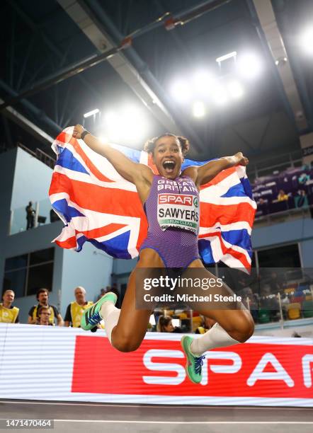 Jazmin Sawyers of Great Britain celebrates after winning the Women's Long Jump Final during Day 3 of the European Athletics Indoor Championships at...