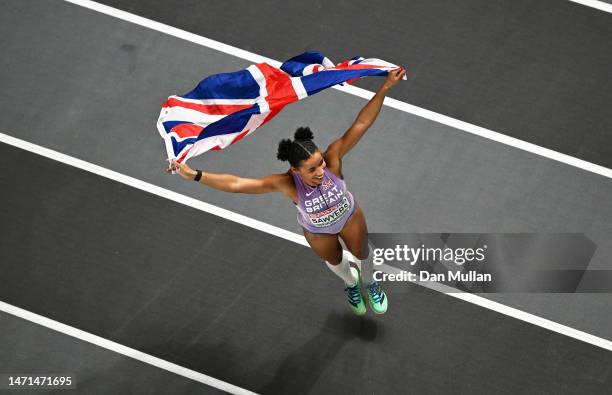 Jazmin Sawyers of Great Britain celebrates after winning the Women's Long Jump Final during Day 3 of the European Athletics Indoor Championships at...