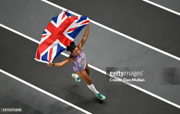 Jazmin Sawyers of Great Britain celebrates after winning the Women's Long Jump Final during Day 3 of the European Athletics Indoor Championships at...