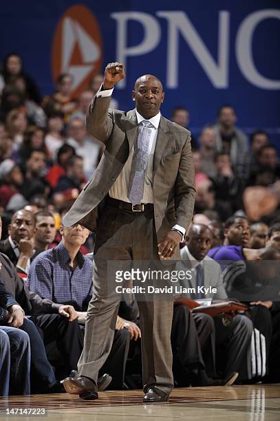 Sacramento Kings Head Coach Keith Smart coaches his team from the sidelines during the game at The Quicken Loans Arena on February 19, 2012 in...