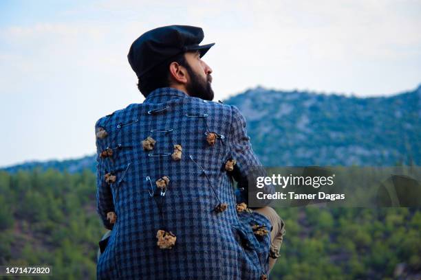 a bard in an artistic costume on the mountain - bard stock pictures, royalty-free photos & images