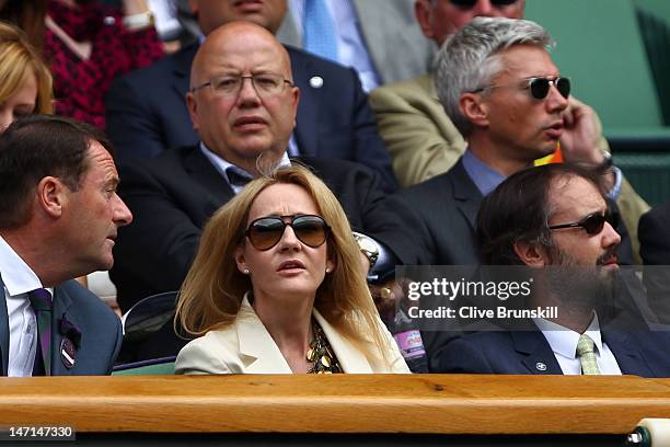 Author J. K. Rowling , Neil Murray and Triple Jumper Jonathan Edwards watch the Ladies' Singles first round match between Petra Kvitova of the Czech...