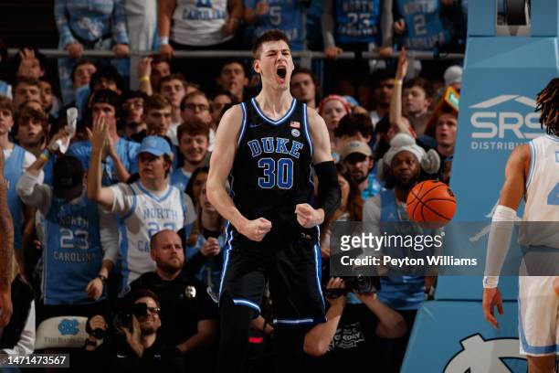 Duke Blue Devils center Kyle Filipowski celebrates during a game against the North Carolina Tar Heels on March 04, 2023 at the Dean Smith Center in...
