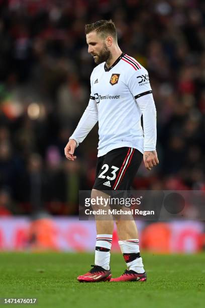 Luke Shaw of Manchester United looks dejected after their side's defeat during the Premier League match between Liverpool FC and Manchester United at...