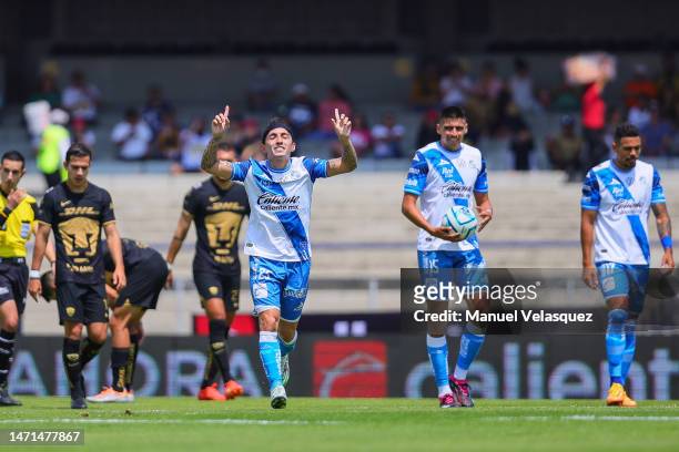 Omar Fernández of Puebla celebrates after scoring the team's first goal during the 10th round match between Pumas UNAM and Puebla as part of the...