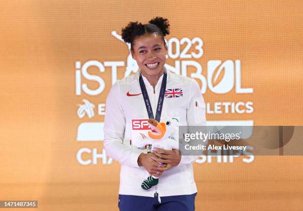 Gold Medallist Jazmin Sawyers of Great Britain pose the Women's Long Jump Final during Day 3 of the European Athletics Indoor Championships at the...