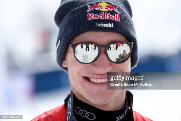 Marco Odermatt of Team Switzerland celebrates on the podium after winning the Audi FIS Alpine Ski World Cup Men's Super G on March 05, 2023 in Aspen,...